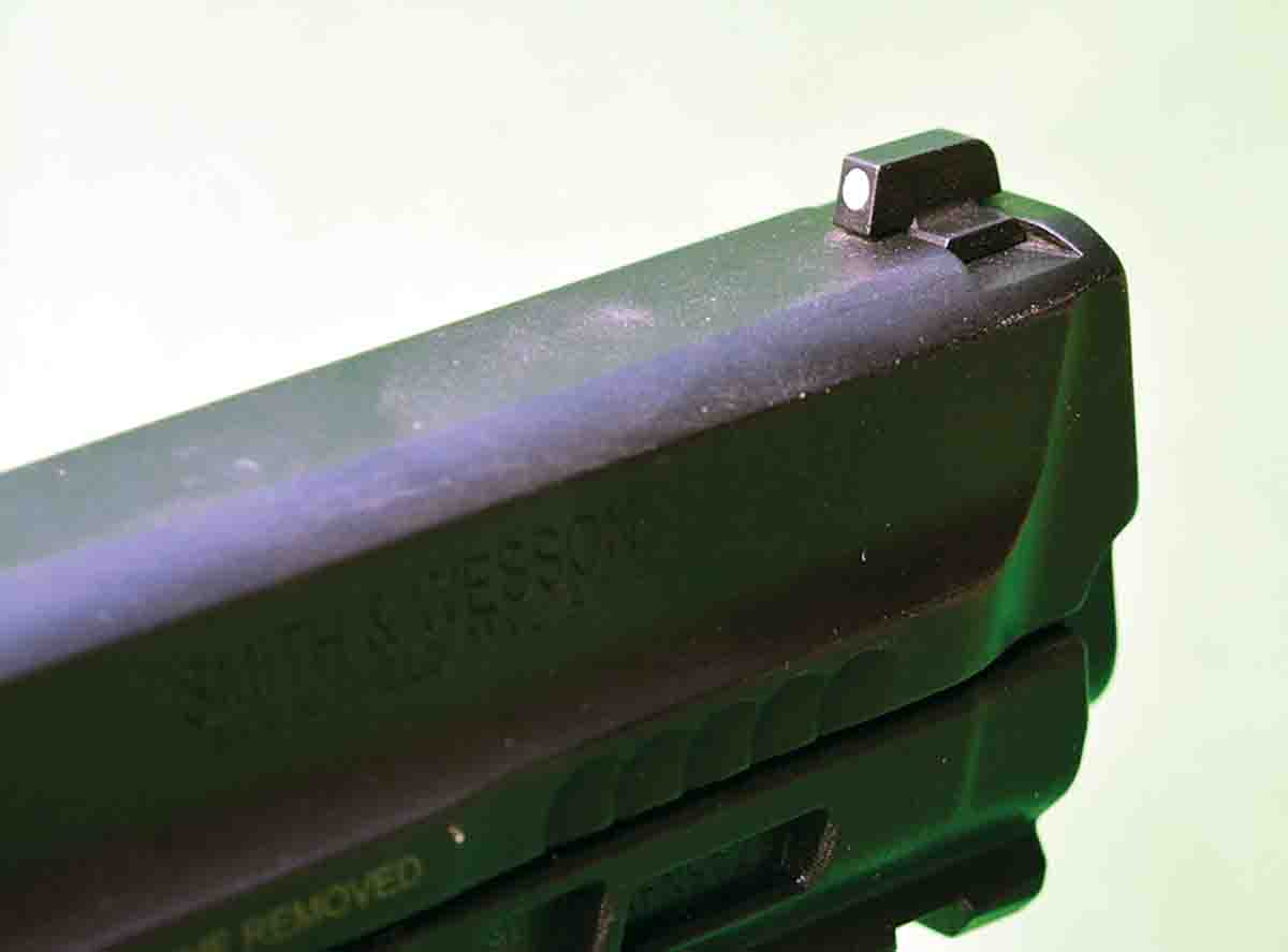 The Novak front sight is dovetailed into the slide.